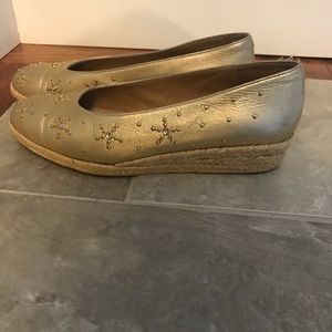 Gold Stuart Weitzman espadrilles